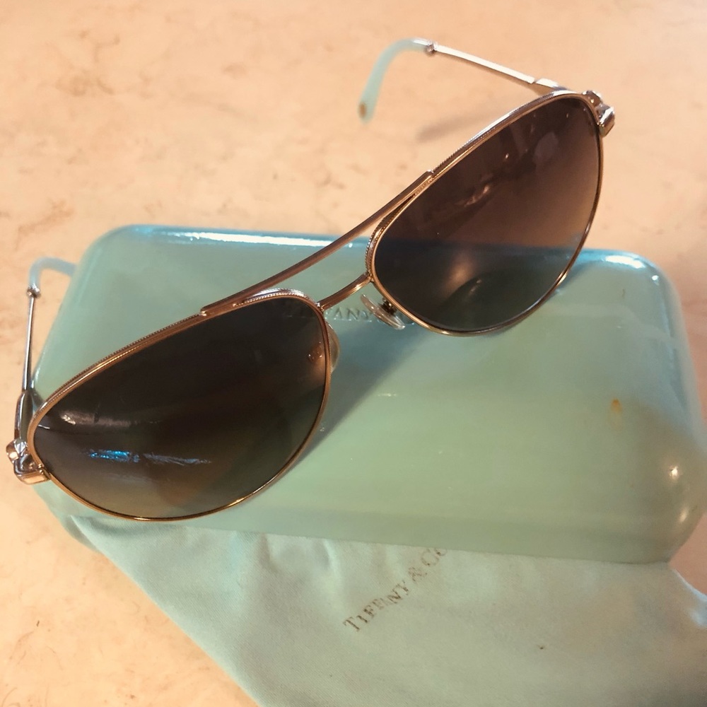 Tiffany’s aviator with pearl on side. Is missing one on the left side.